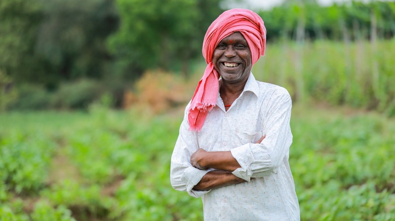 A smiling Indian farmer