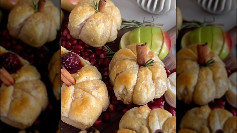 finished mini brie pumpkins on table spread