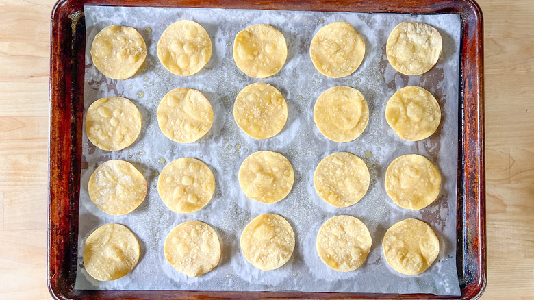 mini tortillas on baking sheet