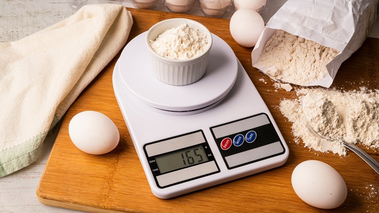 Ramekin of flour on digital scale