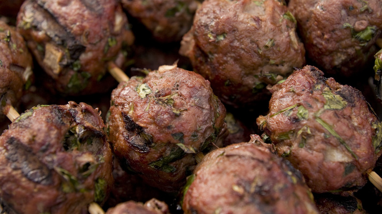 closeup of meatball skewers