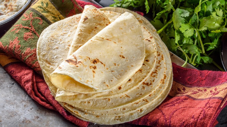 Stack of tortillas with herbs