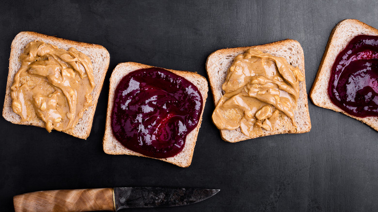 Making peanut butter and jelly sandwiches, top view