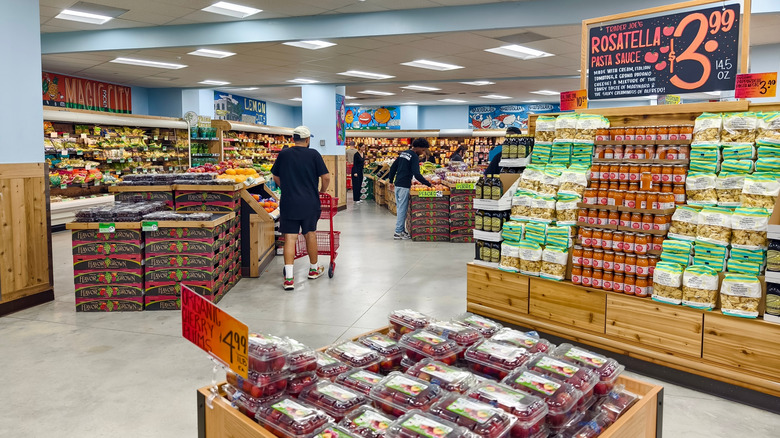 Customers shop for groceries at Trader Joe's