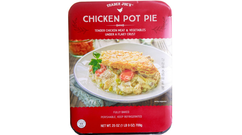 A container of Trader Joe's Chicken Pot Pie sits against a white background