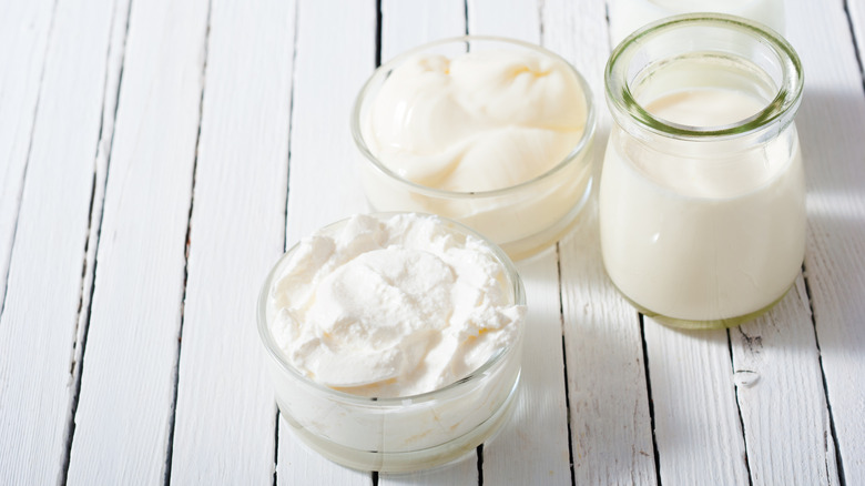 various dairy products in glass containers