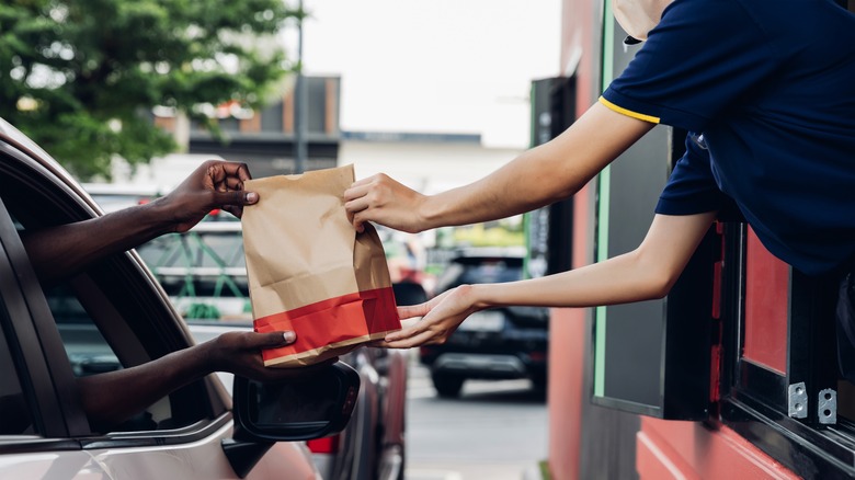 Person ordering at McDonald's drive thru