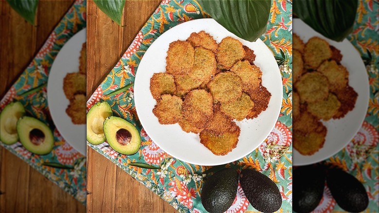 Avocado chips on white plate