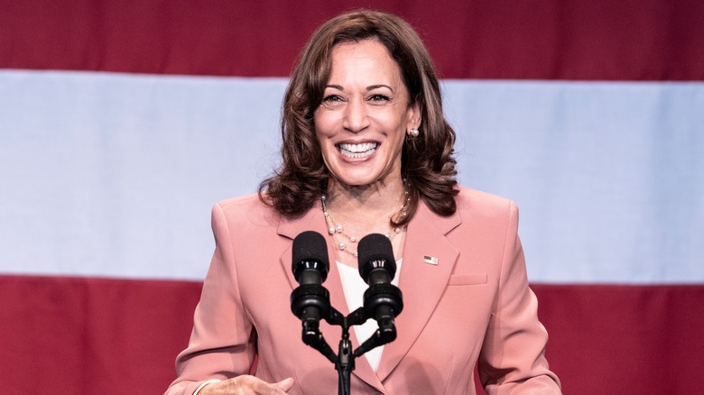 Kamala Harris at podium smiling