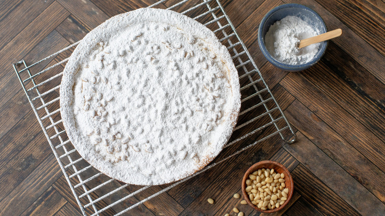 torte with powdered sugar topping