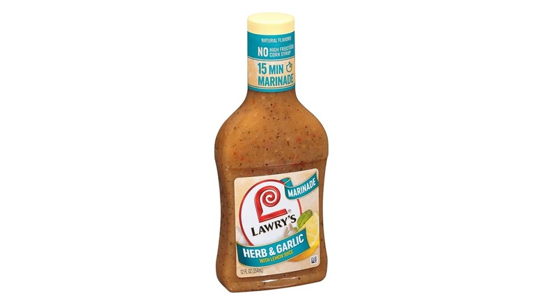 A bottle of Lawry's herb and garlic marinade