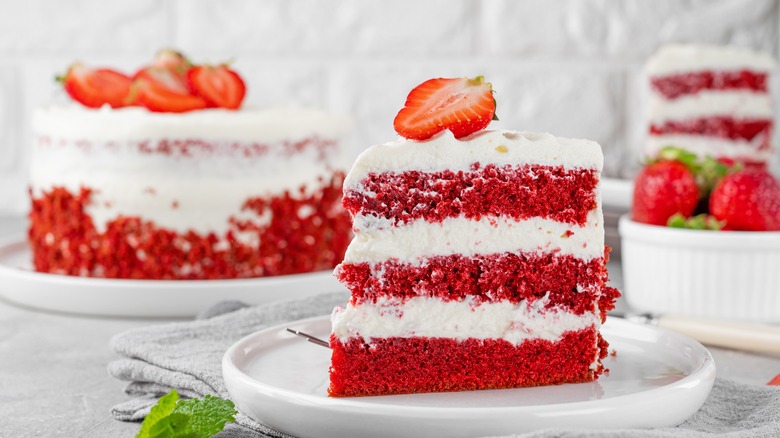 slice of red velvet cake with strawberries