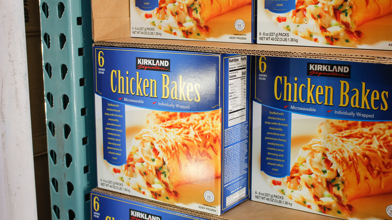 Boxes of Kirkland Signature Chicken Bakes on display.