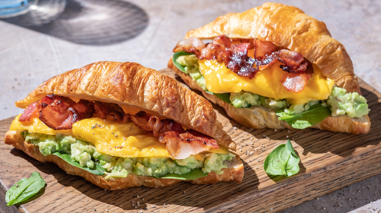 Crispy bacon, cheese, and avocado in a croissant