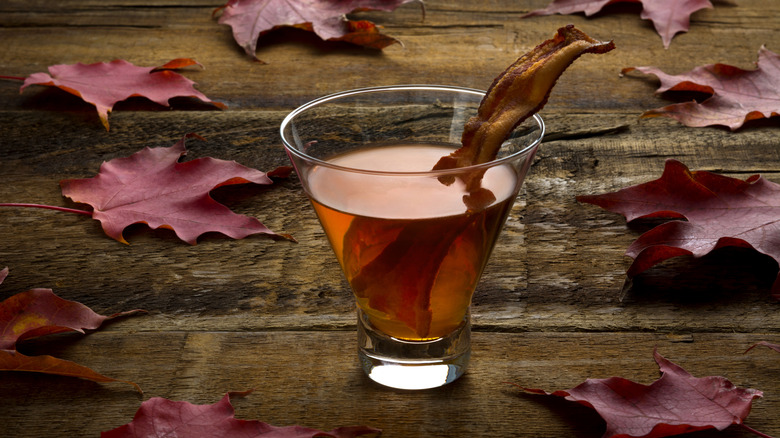 whiskey bacon cocktail with maple leaves