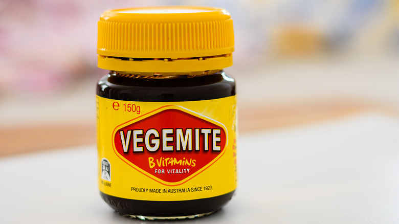 Jar of vegemite on table