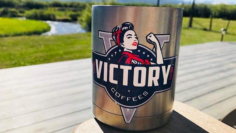 Silver Victory Coffees cup outdoors