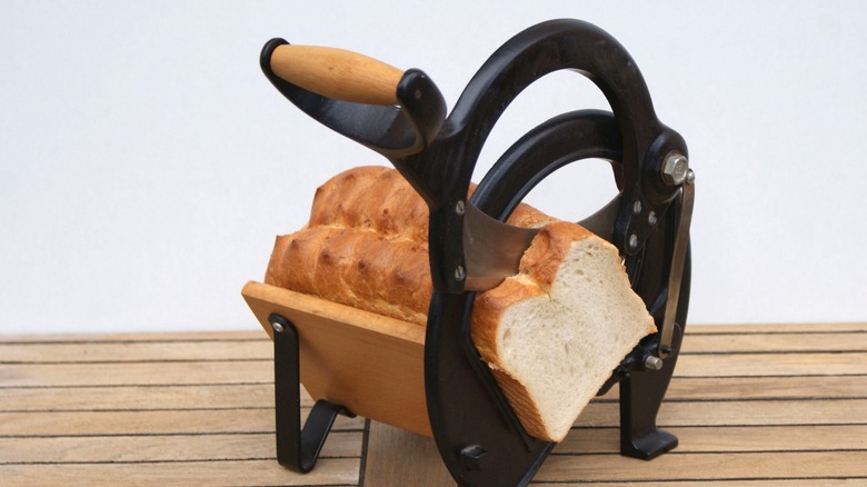 Automatic bread slicing machine hi-res stock photography and