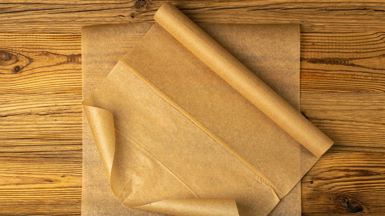 roll and sheet of parchment paper