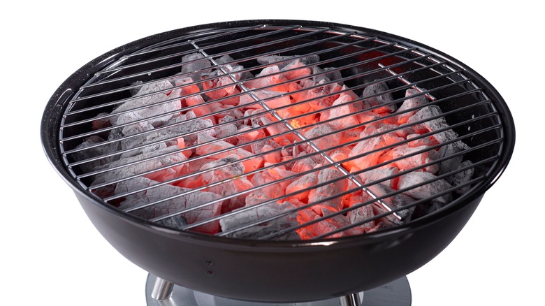 Charcoal grill with glowing coals