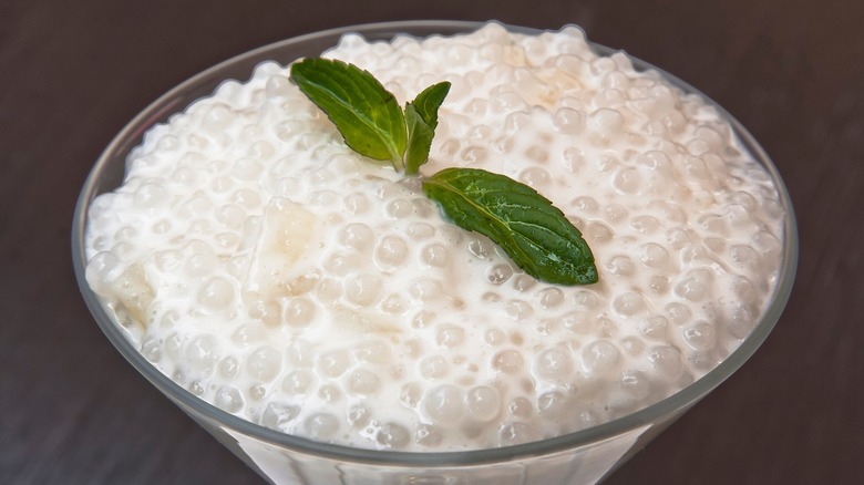 Tapioca pudding with mint leaves in glass