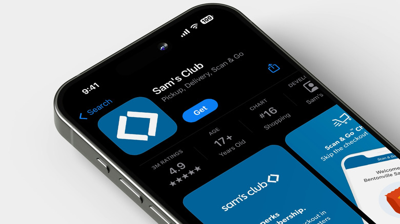 A iPhone sits on a table, screen open to the app store displaying Sam's Club's phone app