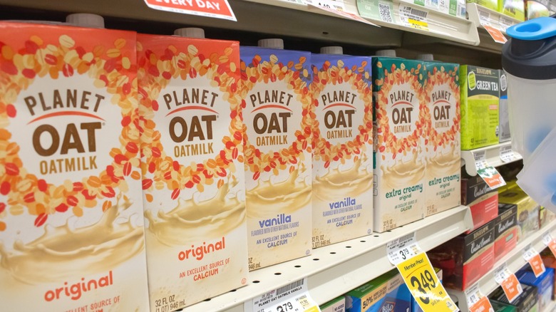 Planet Oat oatmilk containers on market shelf