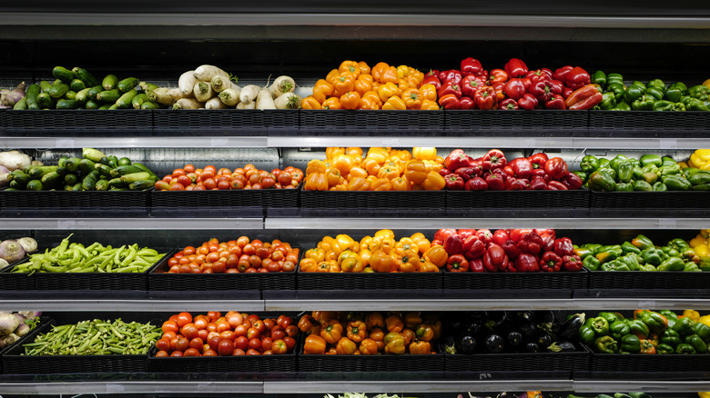 grocery store produce aisle with vegetables