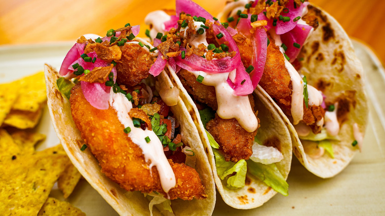 Fried fish taco with condiments