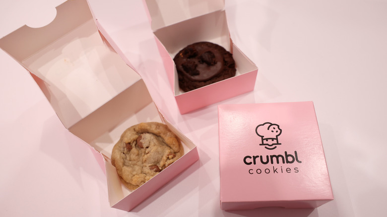 Two individually boxed cookies from Crumbl