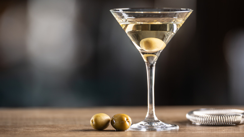 Dry martini garnished with olives