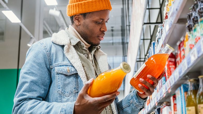 Man shopping for juice