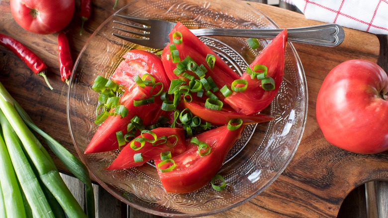 Tomato salad with beefsteak tomatoes and green onions