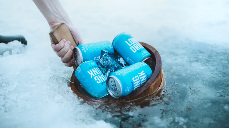 Finnish Long Drinks in bucket in icy river