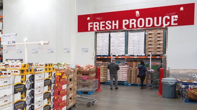 Costco produce section with stacked crates of fruit