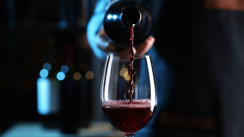 Red wine being poured into glass