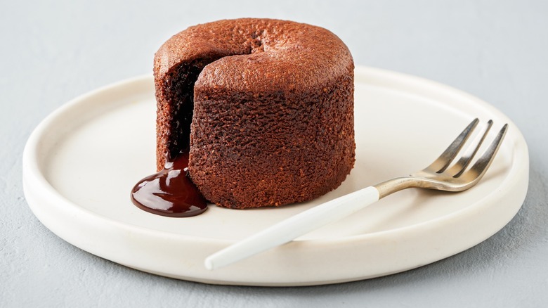 Chocolate molten lava cake on white plate