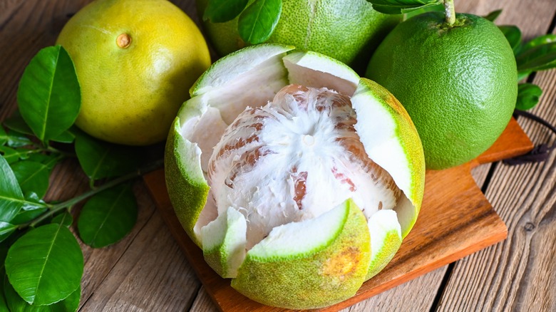 Scored and peeled pomelo