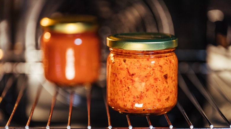 Jars of ajvar in the oven