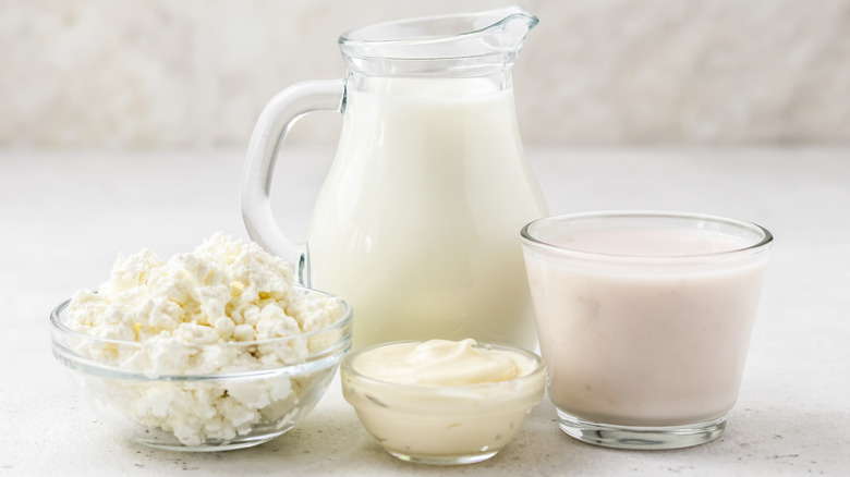 various dairy products in glass jars and ramekins