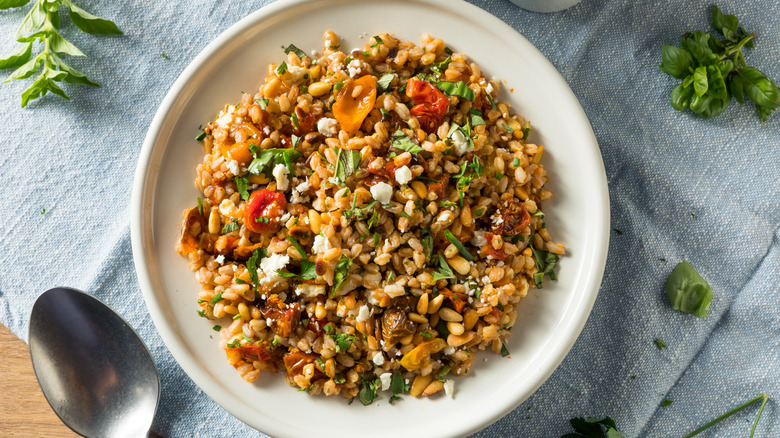 Farro salad with tomato, herbs, and cheese