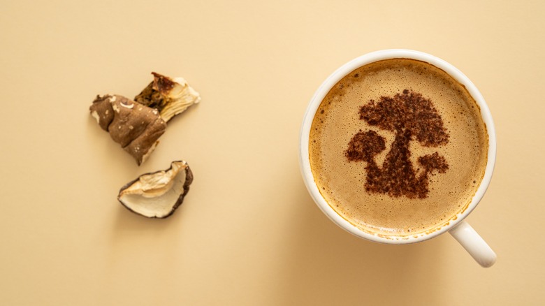 mushroom coffee with decorative pattern on top of drink