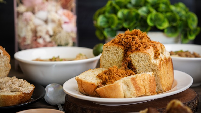 Meat floss bread sliced on plate