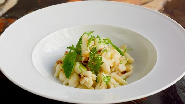 Bowl of spaetzle with quark and herbs