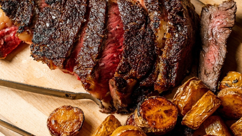 Closeup of steak and potatoes from Smith & Wollensky