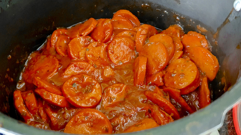 Brazilian hot dog slices in tomato sauce