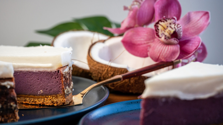 Purple sweet potato Haupia pie plated with a flower and coconut