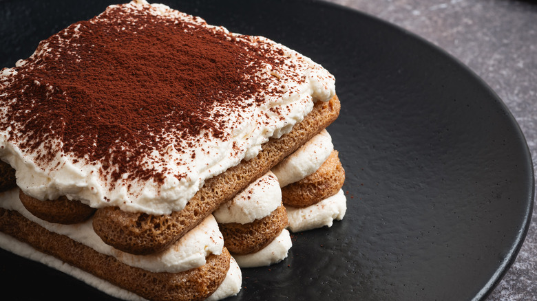 a close up of tiramisu on a plate