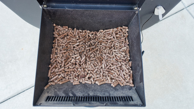 Wood pellets in a smoker hopper