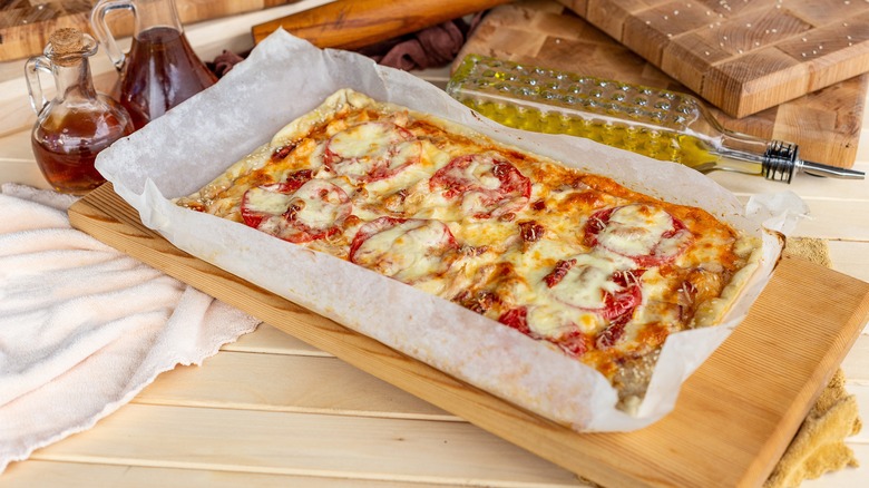 Rectangular pizza on wooden board